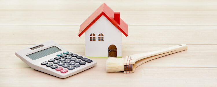 電卓と家のブロックとはけ