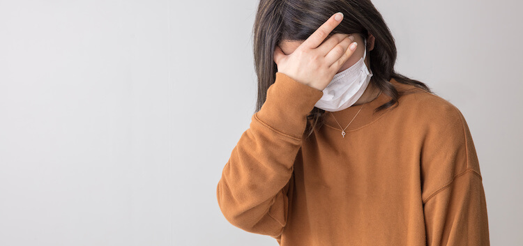 具合が悪い女性